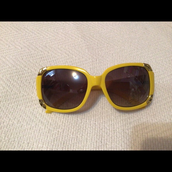 2 pairs of yellow and hot pink sun glasses. - Picture 5 of 9